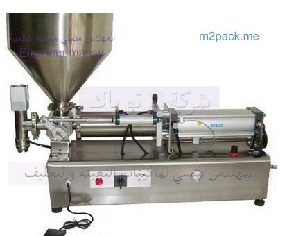 مكنة تعبئة عصير في زجاجات بلاستك شفافه